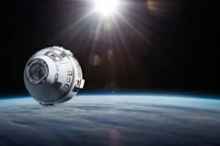 The NASA Starliner in space, traveling to the ISS