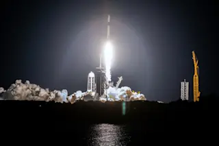 A rocket launching showing the commercialization of space