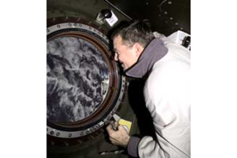 Astronaut James S. Voss contemplates home from the International Space Station.