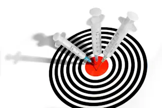 Injections Three Needles Target - Shutterstock