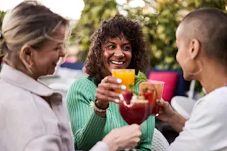 Three people drinking mocktails