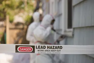 Workers-removing-lead-paint