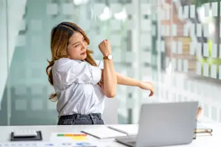 Stretching at desk