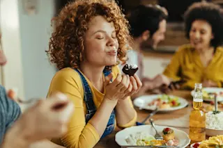 woman eating dessert
