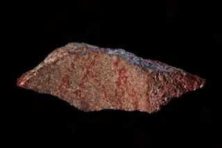 Blombos-Cave-drawing-with-ochre-pencil-on-silcrete-stone.-Craig-Foster-1-1024x683-1024x683.jpg