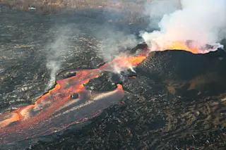 Lava erupting on Kīlauea's Lower East Rift Zone during June 2018. USGS/HVO.