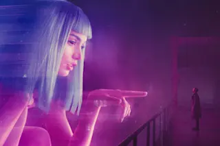 Ryan Gosling regards an AI in Blade Runner: 2049. (Credit: Warner Bros)