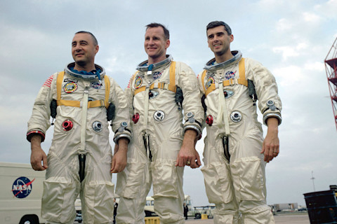 three Apollo astronauts in line