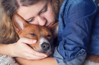 Sad Human with Dog - Shutterstock