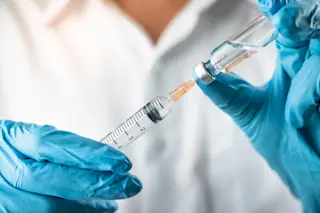 vaccine scientist doctor - shutterstock