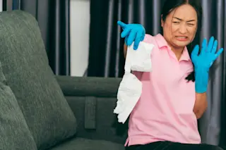 woman disgusted tissue - shutterstock