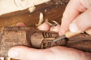 Wood working hand carving - shutterstock