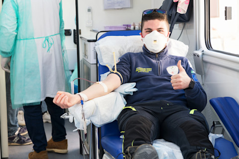 man donating blood coronavirus plasma - shutterstock