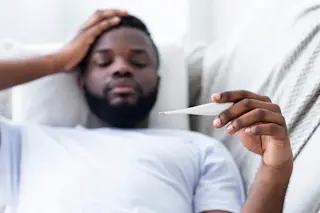 flu or covid-19 fever - shutterstock