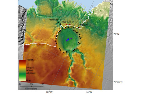 A heatmap shows in green a circular crater depression in a red-and-yellow colored surrounding.