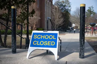 School closed sign playground covid lockdown - shutterstock