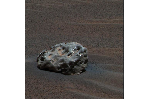a pitted metallic rock