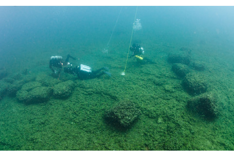 Archaeologist collecting samples as the Funnel Site 7