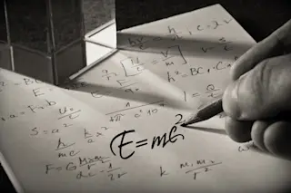 einstein's equation written on a piece of paper - shutterstock 476432692