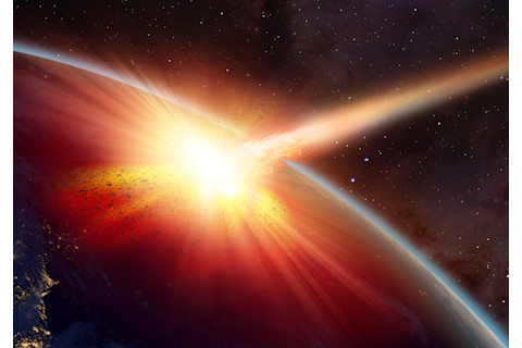 comet asteroid hitting planet earth in space - shutterstock