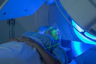 Woman Receiving Radiation Therapy for Cancer Treatment - shutterstock 1091110733