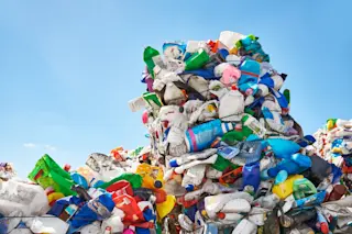 plastic mountain trash and recycling concept - shutterstock