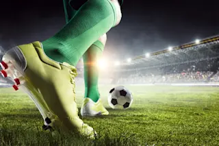 soccer ball kick closeup - shutterstock 652647784
