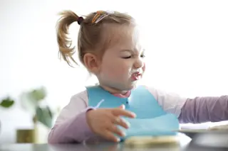 toddler picky eater little girl at table - shutterstock 492304303
