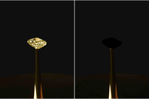 A yellow diamond covered in an ultra-black coating