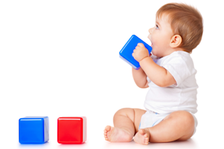 Baby playing with blocks
