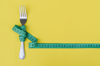 Fork with measuring tape