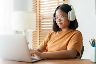 person studying with headphones