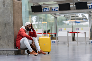 Fatigued person at an airport