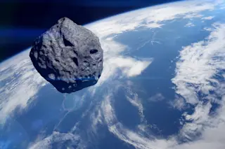 Planet Earth and big asteroid in the space.