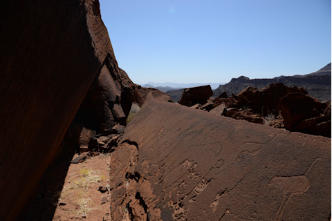 Human and animal carvings on the cliffs of Doro Nawas