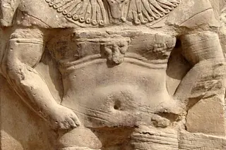 Dwarf Deity Bes, a household deity associated with fertility, music, children