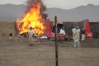 Afghanistan - Circa 2006: A burn pit at a US base.