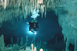 Explorer Robbie Schmitter in an an underwater cave
