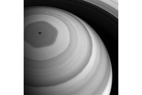 Saturn's hexagon feature towers hundreds of kilometers