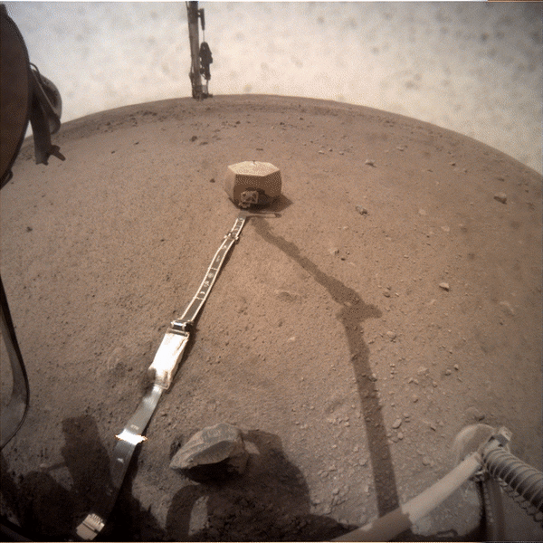 video of InSight placing heat shield over instrument