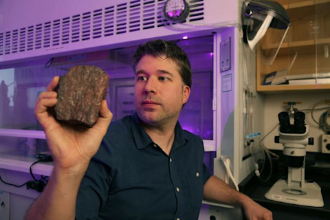 Jonathan O'Neil with rock