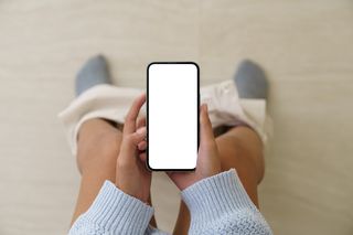 Using phone on the toilet