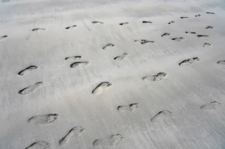 human foot prints in sand