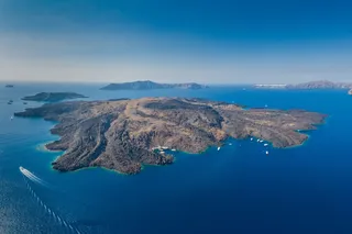 Aerial photo of Nea Kameni volcano island, located in Santorini Aerial photo of Nea Kameni volcano island, located in Santorini