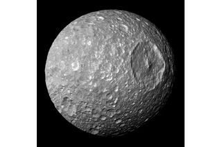 Saturn's moon Mimas, which could sustain a liquid ocean beneath an icy shell