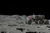 rover vehicle driving on the moon 