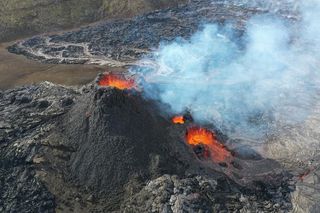 Glowing lava is seen oozing from Iceland's Fagradalsfjall volcano 