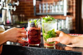 two mocktails at a bar