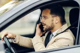 man on the phone while driving