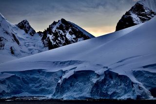 Glacier in Antarctica at sunset Glacier in Antarctica at sunset